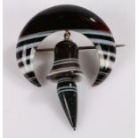 Banded agate broch, with a crescent and bell pendant drop, 40mm diameter