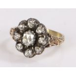 19th Century diamond set ring, with a central diamond and diamond surround estimated at a total of