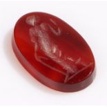 Loose agate seal, the intaglio with a figural design 20mm high