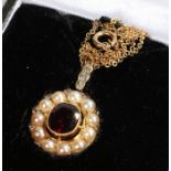 Garnet pearl and diamond set pendant necklace, with a central garnet and pearl surround, the