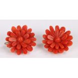 Pair of carved coral earrings, in the form of flower heads, 28mm diameter