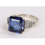 Synthetic sapphire set ring, with square cut synthetic sapphire flanked by clear baguette stones,