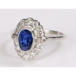Ceylon sapphire and diamond set ring, the certificated Ceylon oval cut sapphire at 1.97 carats and