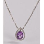Amethyst and diamond set pendant necklace, the pear cut amethyst at 2.58 carats with a diamond