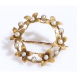 Pearl set brooch, within a leaf round design, 24mm diameter