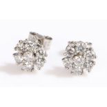 Pair of diamond studs, with flower head designs, 8mm diameter