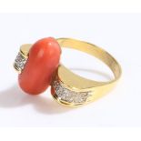 14 carat gold coral and diamond set ring, of modernist design, ring size Q/R