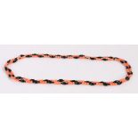 Coral and jet necklace, with round coral beads and elongated jet beads, 117cm long