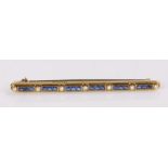 Sapphire and pearl set bar brooch, with a row of sapphires at an estimated 0.75 carats
