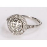 Diamond set ring, the central round cut diamond at an estimated 1,32 carat and a diamond surround on