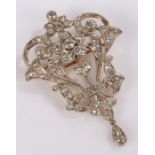 Diamond set brooch, the foliate and swag diamond set brooch on white metal, 40mm diameter