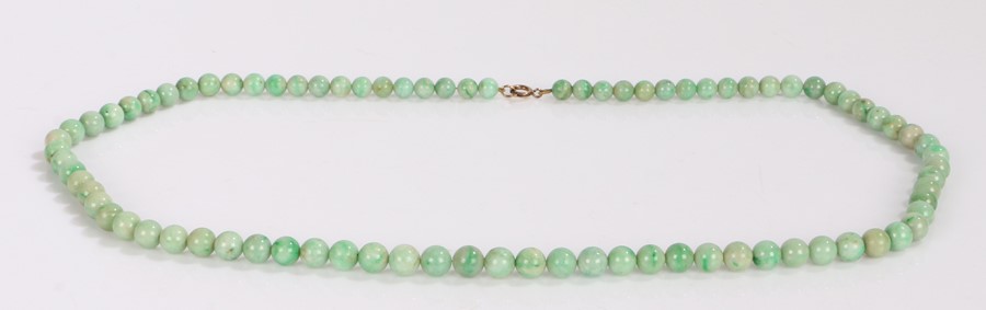 Jade necklace, with a row of beads to the loop claps, 74cm long