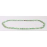 Jade necklace, with a row of beads to the loop claps, 74cm long