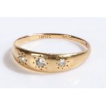 18 carat gold ring set with three diamonds, ring size O1/2, 1.8g