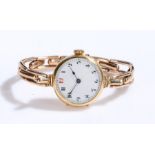 18 carat gold ladies wristwatch, the white dial with Arabic markers, manual wound, the case 25mm