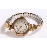 9 carat gold ladies wristwatch, the white engine turned dial with Arabic markers, manual wound,