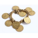 Gilt metal bracelet with nine hanging gaming tokens