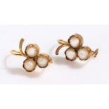 Pair of 18 carat gold earrings set with clear paste, 2.2g