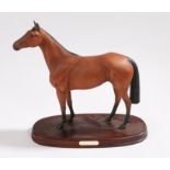 Royal Doulton horse figure, depicting Red Rum, raised on a wooden plinth, 33cm high