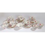 Royal Stafford Carousel pattern part tea service, consisting of nine teacups, twelve saucers, twelve