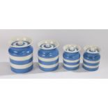 Four T.G.Green Cornish Kitchen ware storage jars, with banded blue and white decoration, the largest
