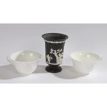 Wedgwood Jasper vase in black, 14cm high, together with two Wedgwood bone china cups, 11cm