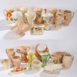 Large collection of Arthur Wood pottery to include various jugs and vases, baskets, cruet set, a box