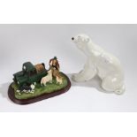 Large USSR Polar Bear, modelled in a kneeling position, stamped to base, 26cm high, and a Leonardo