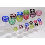 Set of ten Bohemian style cut wine glasses, together with ten smaller coloured cut glasses (20)