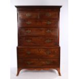 19th Century mahogany chest on chest, the Greek key cornice above two short and five long drawers
