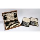 Set of six each silver plated fish knives and forks, with a pair of matching servers, housed