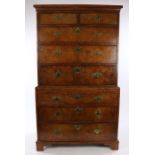 George III walnut secretaire chest on chest, the concave cornice above two short and two long