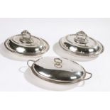 Pair of silver plated entree dishes and covers, each with beaded borders, together with an oval