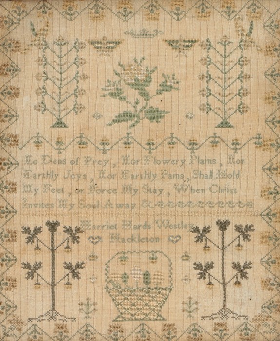 19th Century needlework sampler, with central verse surrounded by foliage and a basket, inscribed