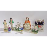 Six Victorian Staffordshire figures, including 'Death of Nelson', Little Red Riding Hood, a pair