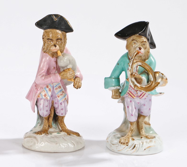 Two Dresden porcelain monkey band figures, 20th century, after the 18th century Meissen models by