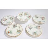 Set of six late Victorian plates, with painted floral decoration and a matching comport, (7)