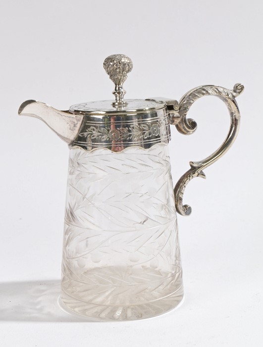 Silver plated and glass whiskey noggin, the hinged lid with ball shaped finial and floral engraving,