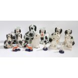 Five pairs of Staffordshire dogs, to include one pair in the form of jugs, together with a pair of