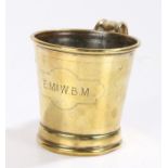 19th Century brass cup, of tapering form, the body engraved "E Mc W.B.M", 8.5cm high
