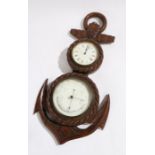 Maritime interest, a clock/barometer with a carved frame as an anchor, the white dials with Roman