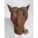 Large early 20th Century Butchers trade sign, carved as a Cow head with a daisy clutched in the
