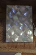 19th Century mother of pearl card case, with interior purple divides, 8cm x 11cm