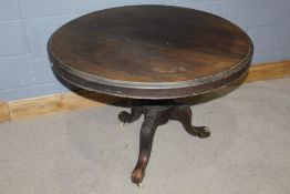 Victorian mahogany breakfast table, with a circular hinged top and cariole legs to the base