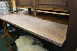 Early 20th Century mahogany drop-leaf table, the rectangular top raised on tapered legs, 128cm wide