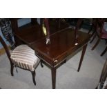 Edwardian mahogany card table, the rectangular frieze top raised on square tapering legs 76cm wide