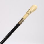 French 19th Century ivory cane, with a smooth tapering handle and carved name plaque above an