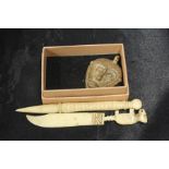 Bronze monkey head pendant,carved bone paper knife and needle (3)