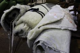 Three small sheepskin rugs, two with Glen Rug labels to the back (3)