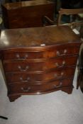 George III style mahogany effect chest, having serpentine top above four long drawers, 76cm wide